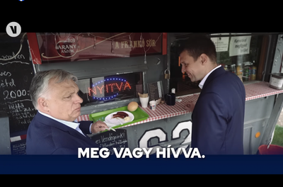 Orbán Viktor sült kolbászt fogyasztott a tinnyei Üvegtigrisnél